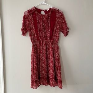 Romantic red dress with sheer details
